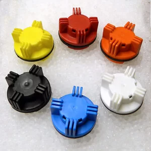 Available colors for model #1050 battery vent caps are yellow, red, orange, black, blue, and white.