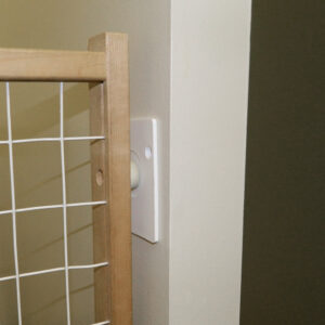 Picture of wall protector with baby gate.